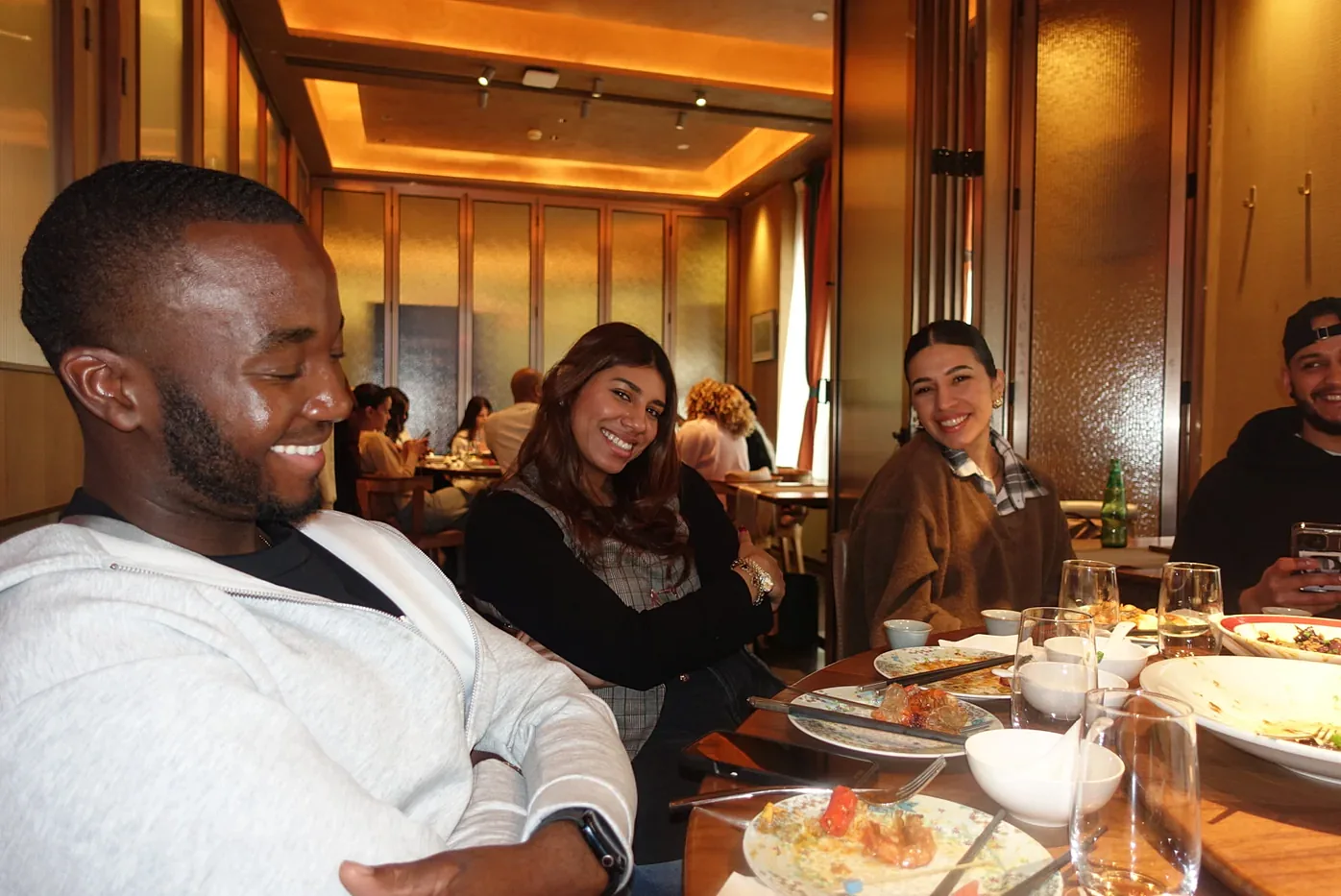 Travel and LIV travelers at dinner on a previous trip