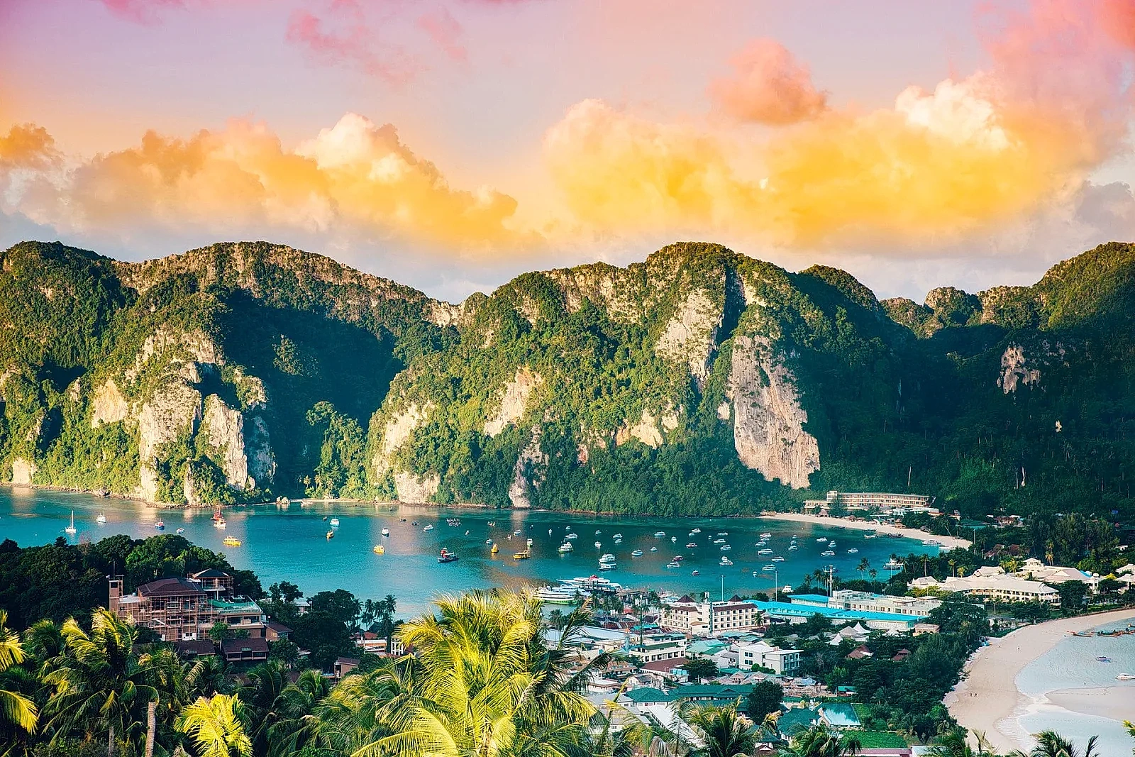 Emerald lagoons and limestone cliffs of Maya Bay on a Travel & LIV departure