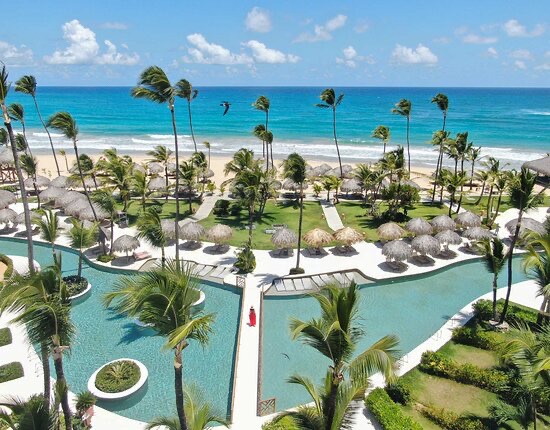 Punta Cana beachfront resort aerial with pool and beach